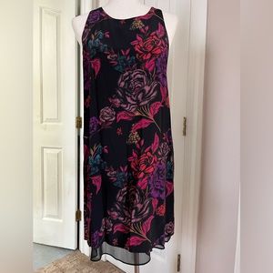Alice + Olivia dress.  Round neck in front with beautiful back. Size M